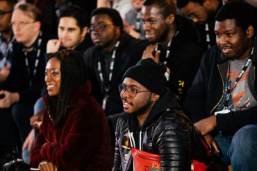 A group of black gamers seated together